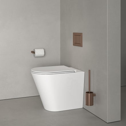 Faro Polished White Back To Wall Rimless Toilet with Concealed Cistern and Brushed Copper Flush Plate