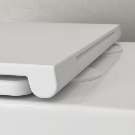 Faro Polished White Back To Wall Rimless Toilet with Concealed Cistern and Brushed Copper Flush Plate